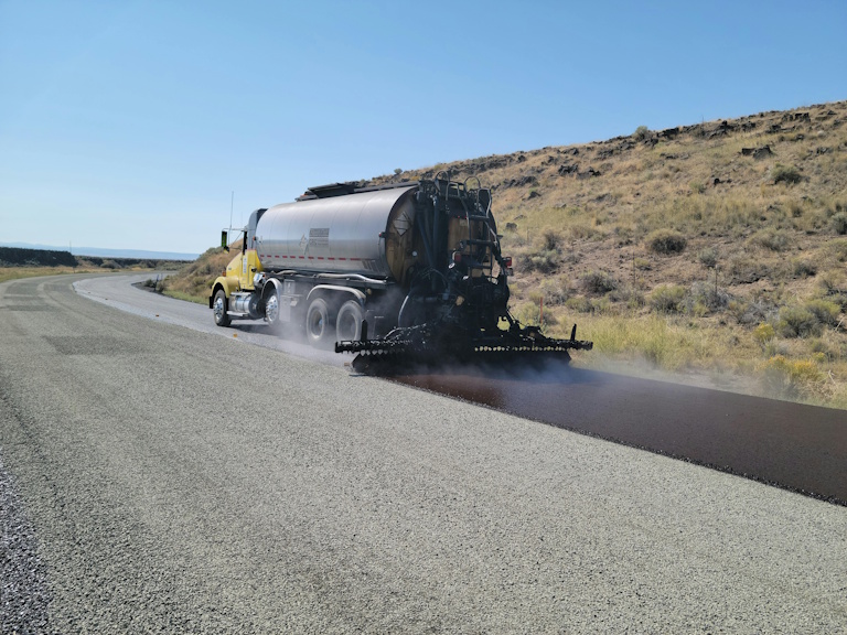 Asphalt surfacing and compaction
