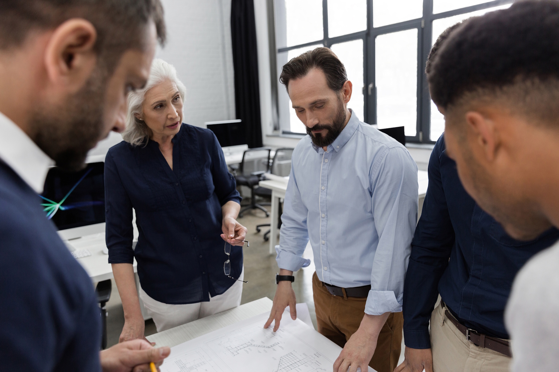 Implementation team configuring the platform on customer data
